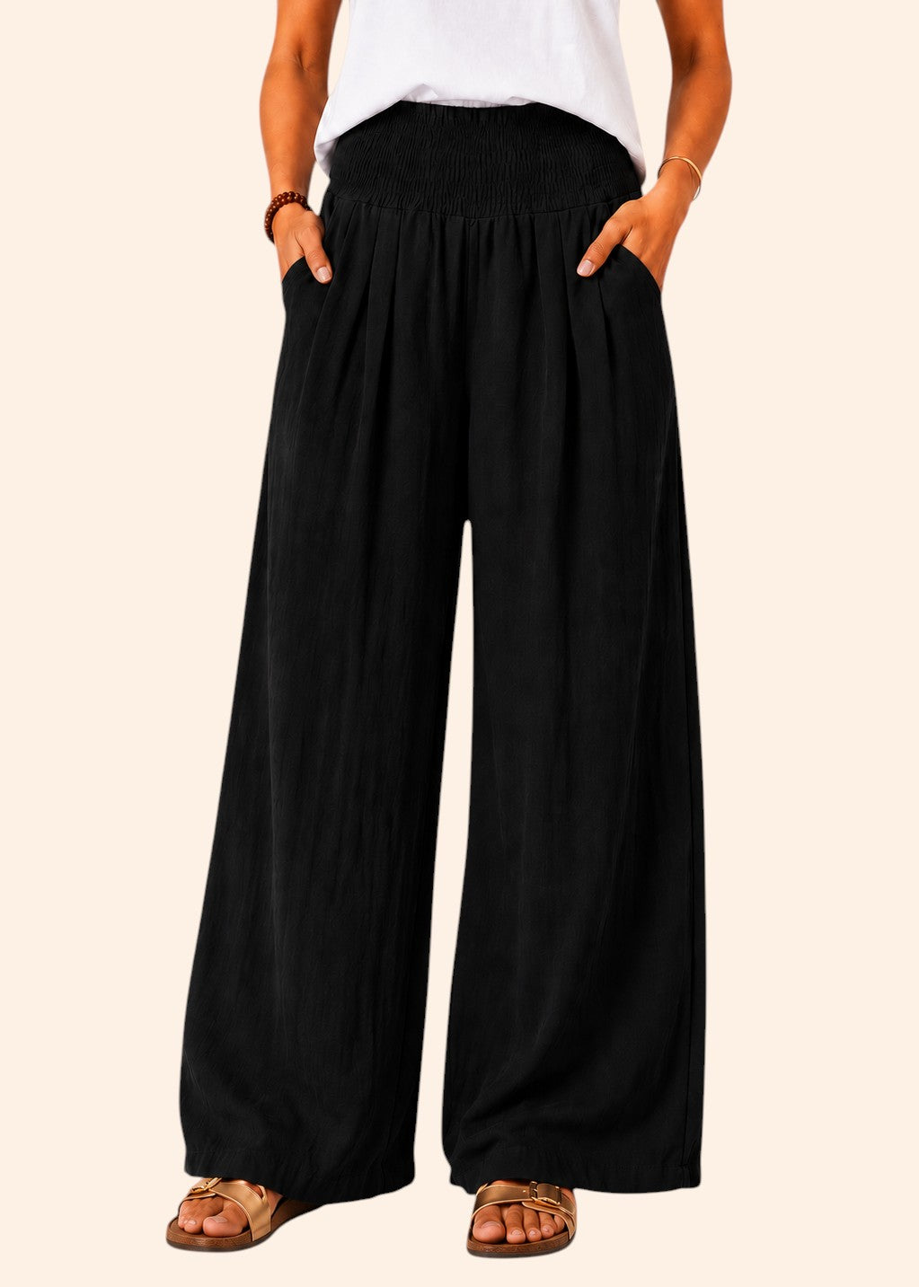 Zeemara black wide-leg pull-on pants featuring a shirred waistband and side pockets worn with a white top